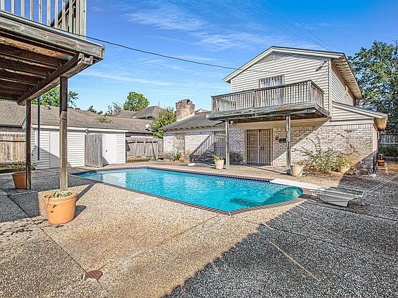 A sparkling pool awaits you! Both homes feature a balcony, offer birds eye views of the pool and a shady spot on a hot summer day!