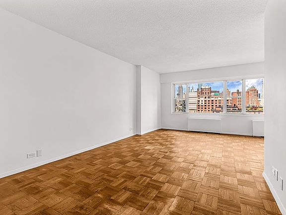 3rd image of 60 E 8th St APT 14J