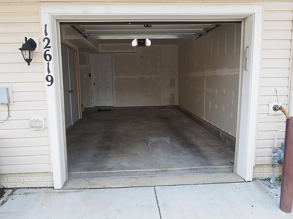Garage with storage space to side. Street parking is also available.