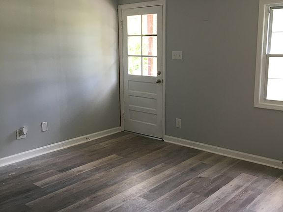 Living area of 403 Maple Street. 
The Front door entrance leads to the living/dining area of the house.