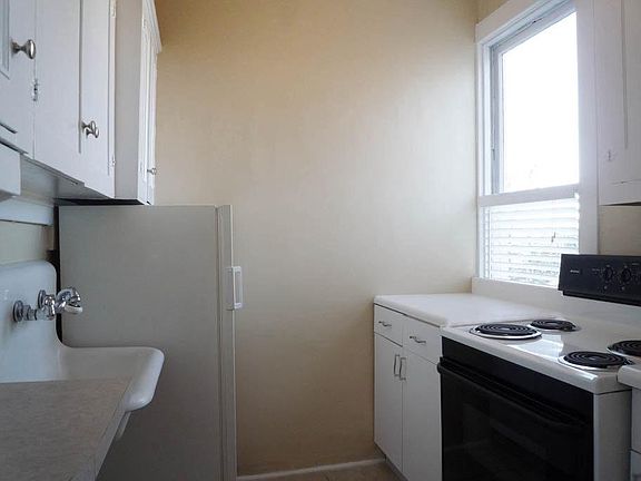 Fridge has already been upgraded with newer, larger fridge. Sink will be replaced on turn-over. Photo of replacement sink provided. We will update this listing with new photos once the work is completed, assuming the vacancy hasn't already been filled.