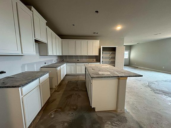 Construction progress - kitchen with large center island and walk in pantry