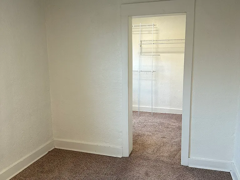 Main bedroom looking into the walk in closet.