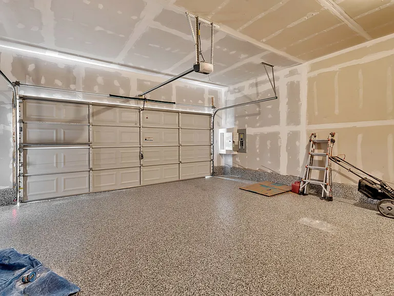 2-car garage with EV plug in charger to connect. Charger not included.