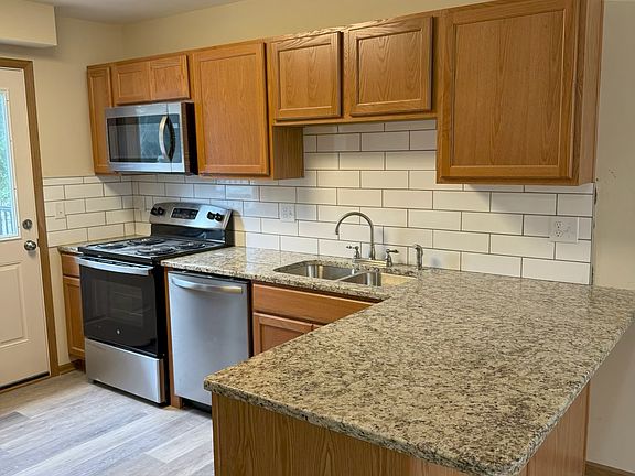 Kitchen with Stove, Refrigerator & Dishwasher