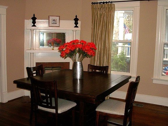 Generous dining room with great flow between living room and kitchen. Perfect for entertaining! Orig