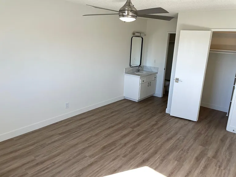 Flat level master bedroom with view of walk in closet and external sink.
--
Washing machine connection, approximate width of area in split level apartments.
--
*Floor plans are digital renderings. All dimensions are approximate. Actual product and specifi