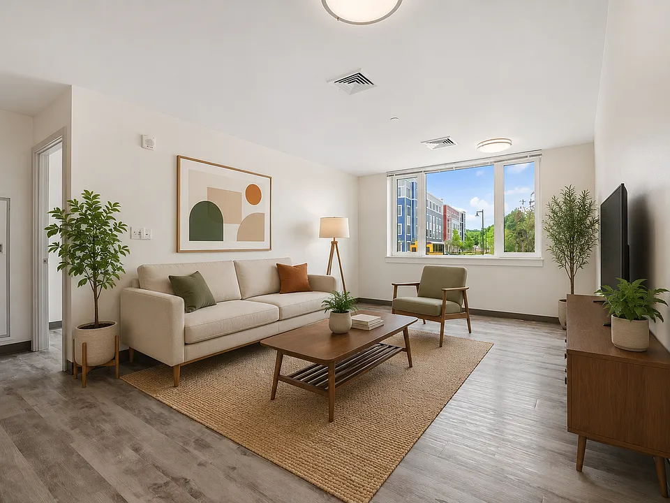 Spacious budget friendly apartment living area at The Phoenix