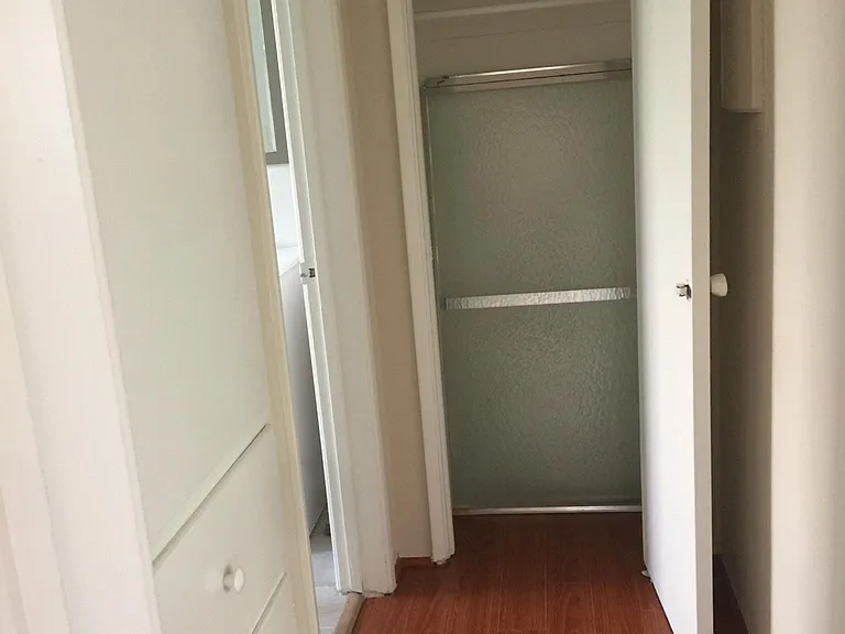 Hallway with Cabinets and Closet