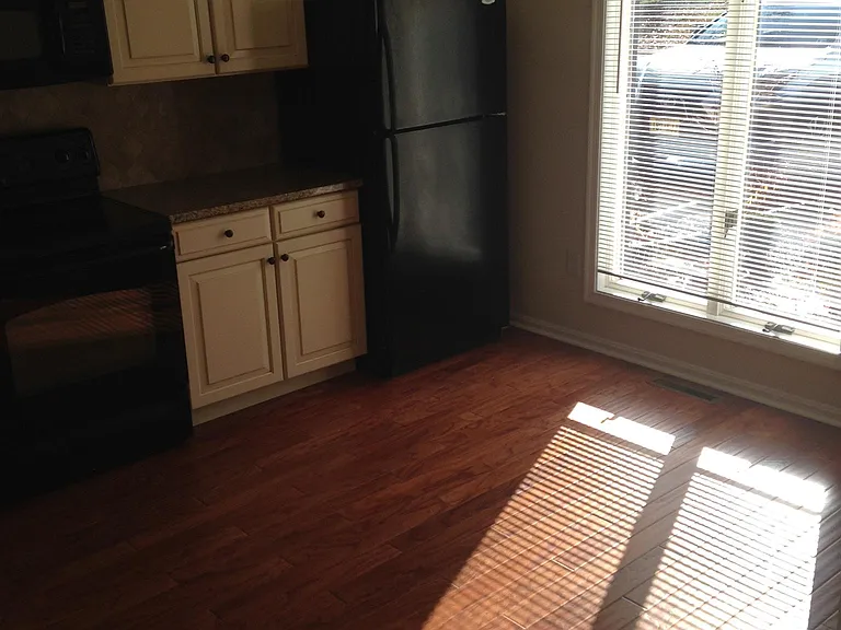 Kitchen, granite tops, hardwood, upgraded cabinets and appliances, new stainless steel refrigerator