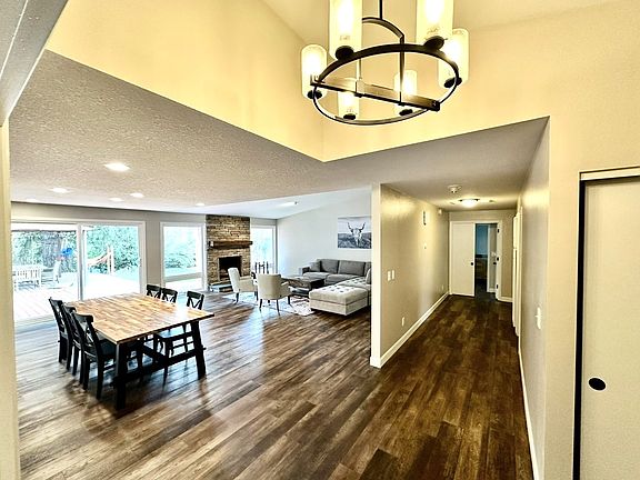 Formal dining and living room with fireplace