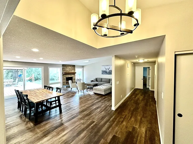 Formal dining and living room with fireplace