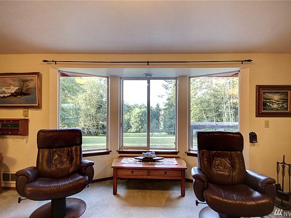 Watch the wildlife meander through the property with the mountains and manicured lawn as your backdrop.