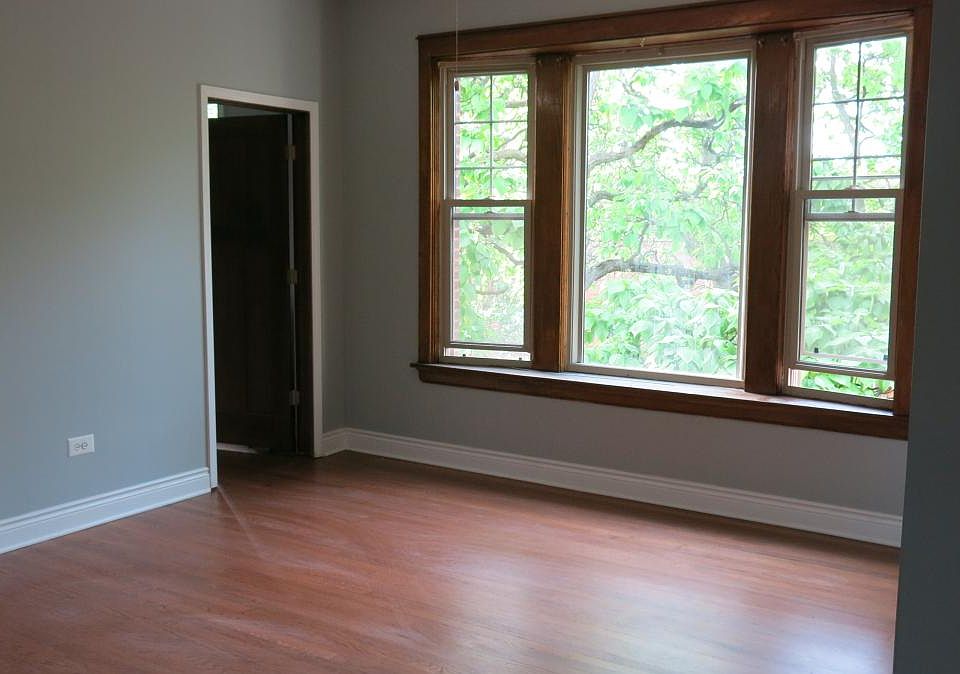 Living room with Reclaimed wood bay window 2nd bedroom in co