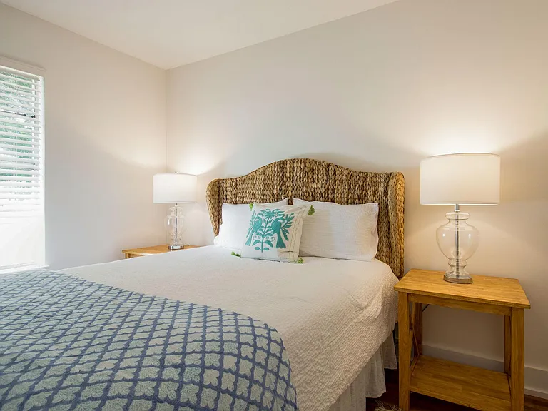 Queen size bed in guest room