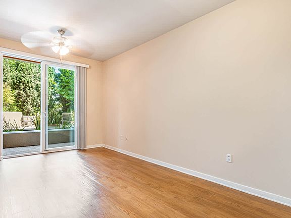 Living Room with Patio and Hard Surface Flooring