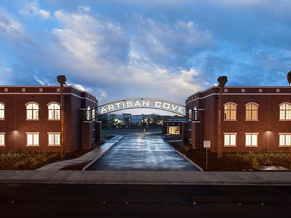 Entrance to 6 acre property under our amazing arch sign and 6 Palm trees
