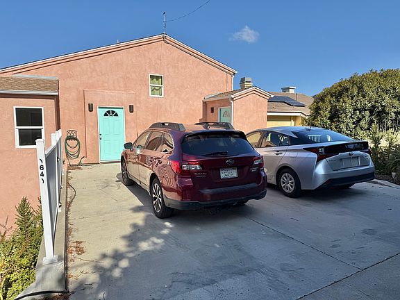 Parking pad with space for 2 cars