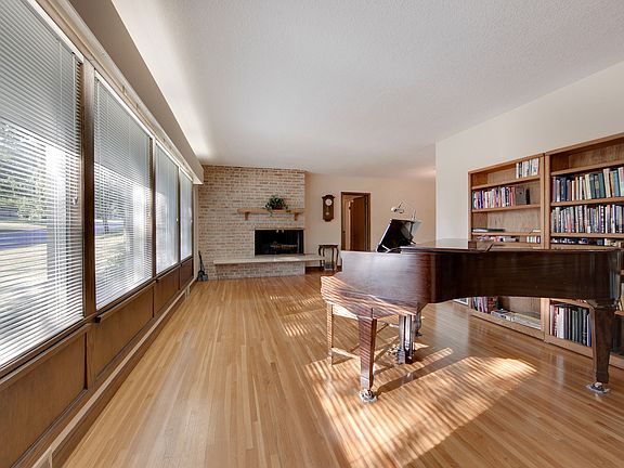 Floor to ceiling windows let the sun stream in