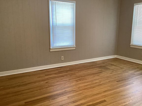 Huge living room with like new hardwood floors
