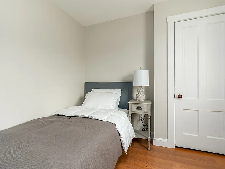The third floor bedroom with a twin bed