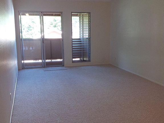 Large living room with balcony patio (large couch available 
