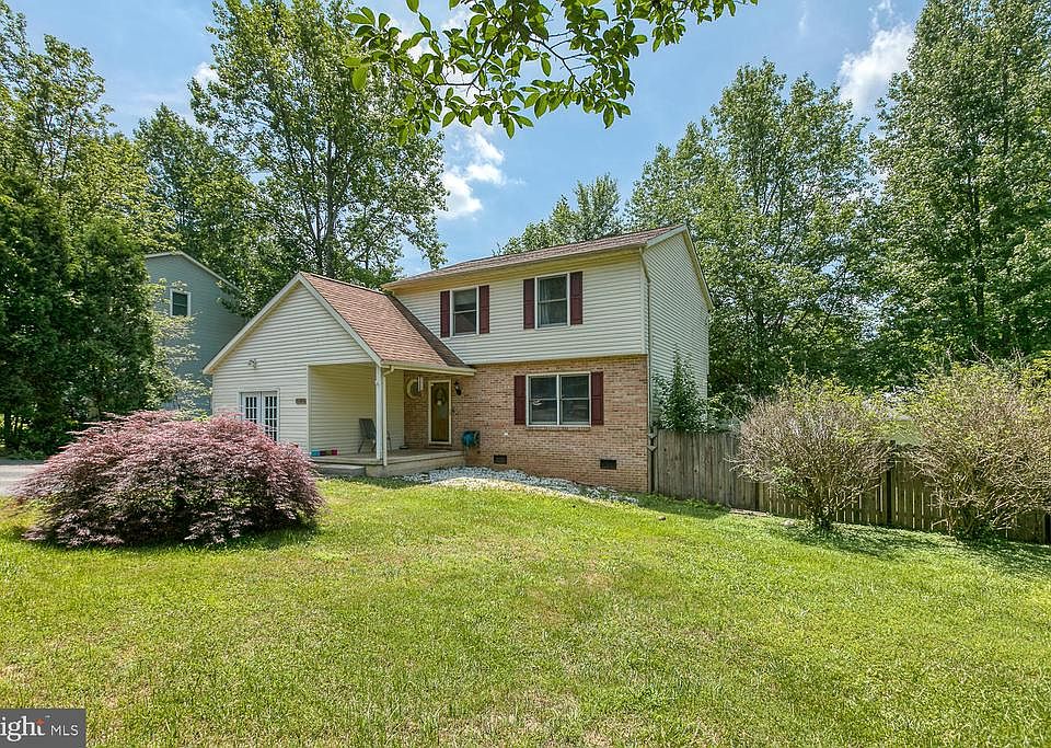 Spacious yard and brick front