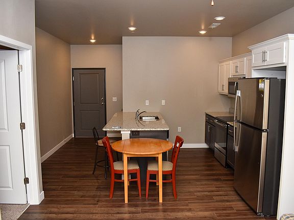 Kitchen and front door (table/chairs included if desired)