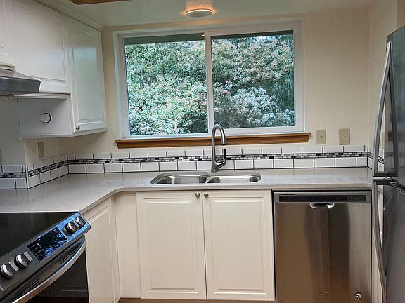 Kitchen with new everything. Counter tops are quartz.