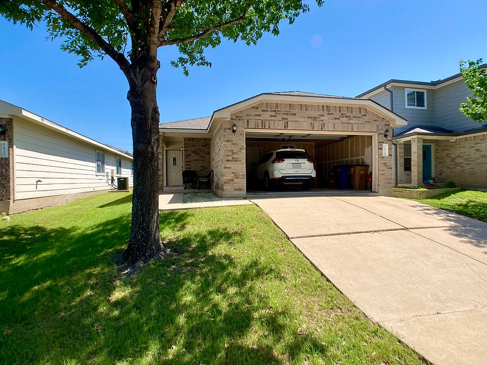 7429 Cayenne Ln, with two car garage.