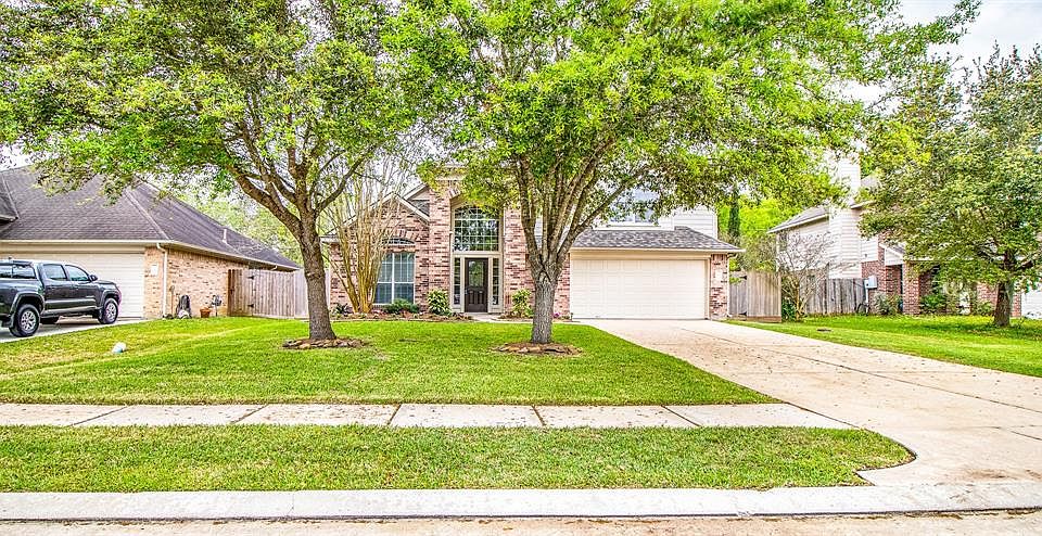 421 Magnolia Way is a two story, brick home in a well kept neighborhood.