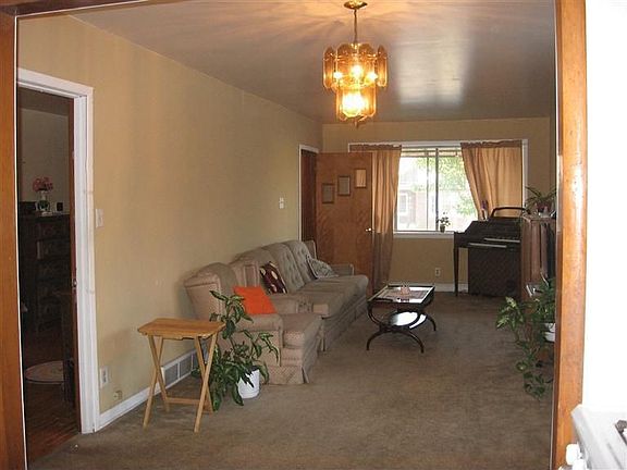 REAR VIEW OF HOME 4 PARKING SPACES