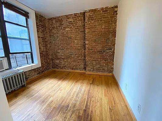 3rd image of 202 E 7th St APT 1C