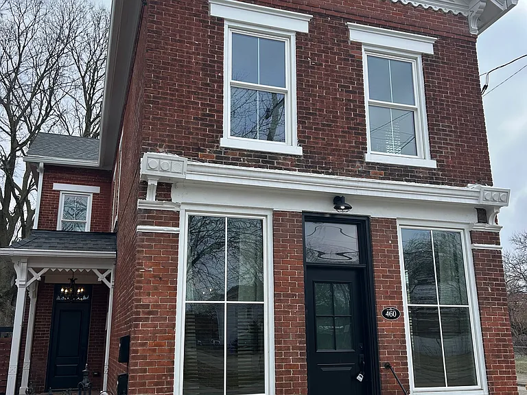 Unit 1 enters from the front, but also has private entrances from the side and backyard. This unit includes a large back yard, with a beautiful privacy fence.