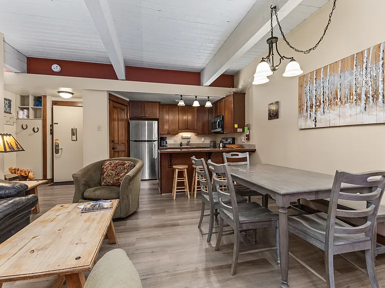 View of Living room into Dining Area and Kitchen