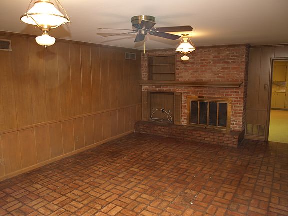 Den with fireplace