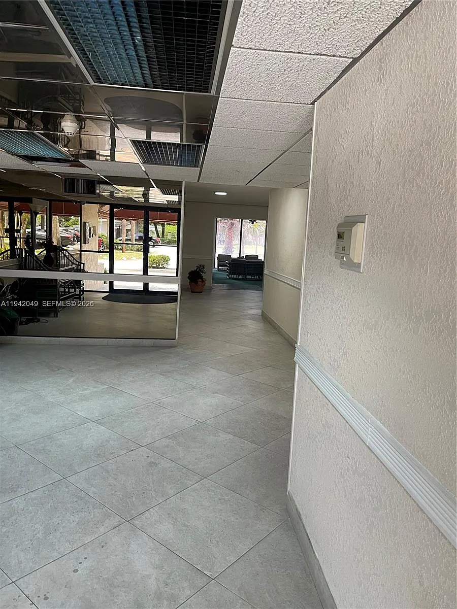 Building Photo - 5530 NW 44th St #103C
