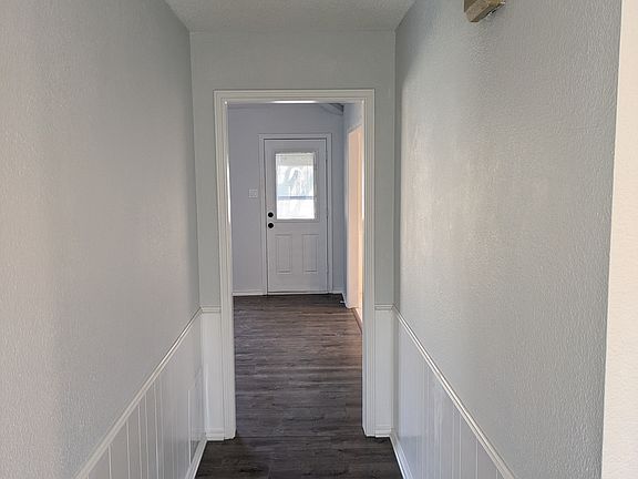 Hallway leading to living room/kitchen