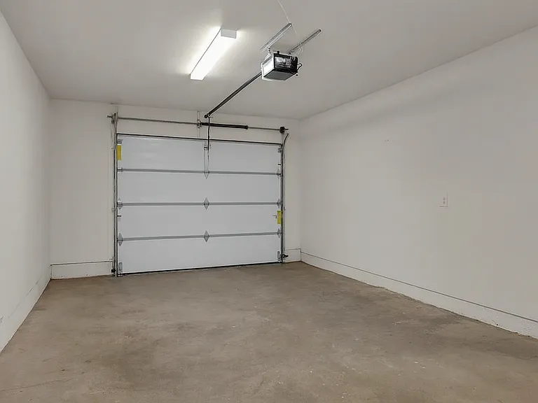 one car direct access garage with washer/dryer
