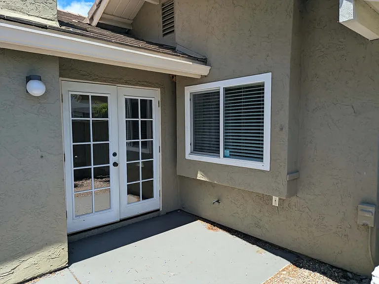 Large enclosed patio w french doors