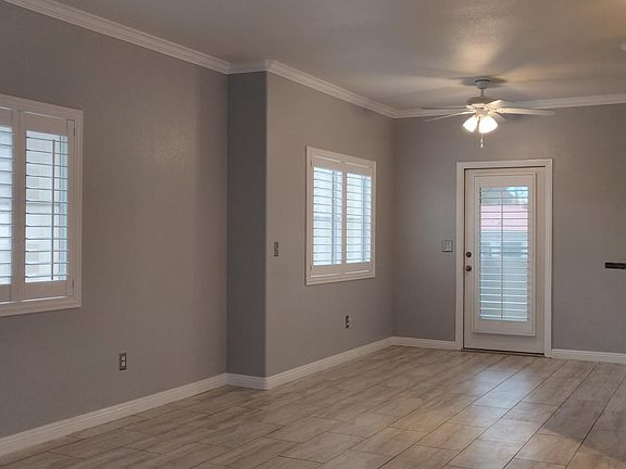 Crown molding and plantation shutters.