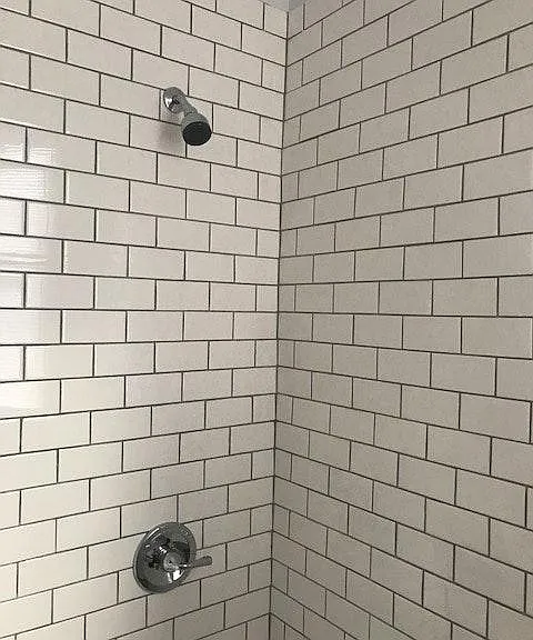 Subway tile shower.