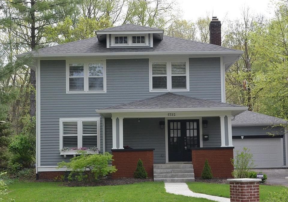 Classic Exterior provides the perfect backdrop for this home worthy of its location in prestigious Forest Hills