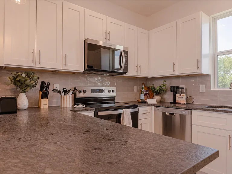 2025 Empire Central Dr #101 — Photo 11