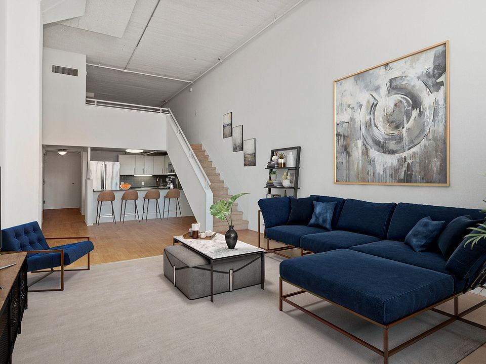 Spacious living room provides ample natural light