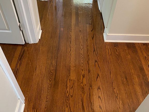 Hallway leading to 3 bedrooms, bathroom & linen closet