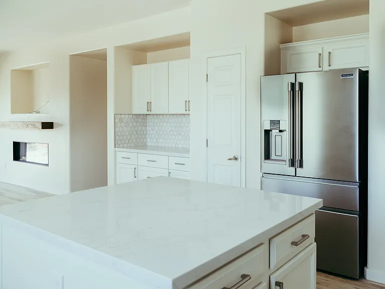 kitchen view including coffee bar