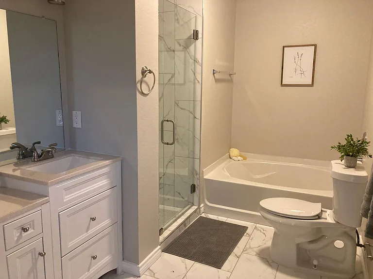 Bathroom 1.
 Master bath with bath and walk in shower. Double sinks