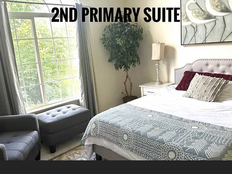 Actual photo of 2nd Primary Suite (new carpet not pictured).