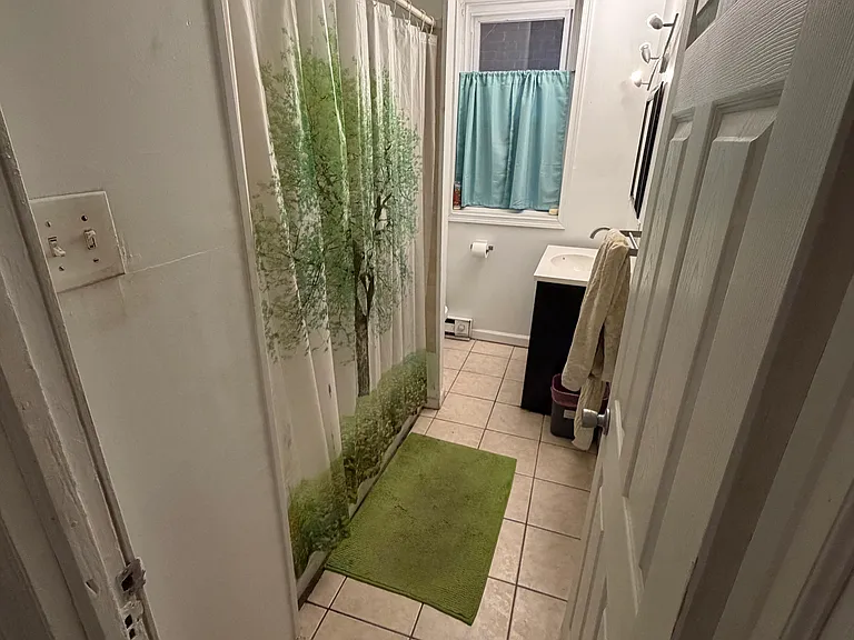Spacious bathroom with full size tub